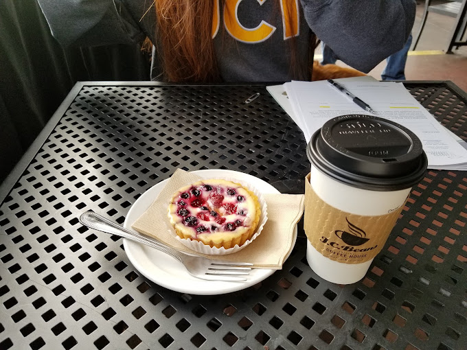 A berry tart and coffee on J.C. Beans' patio table